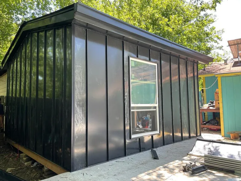 Black standing seam metal wall panels for Metal Roof Installation in Beaver Falls