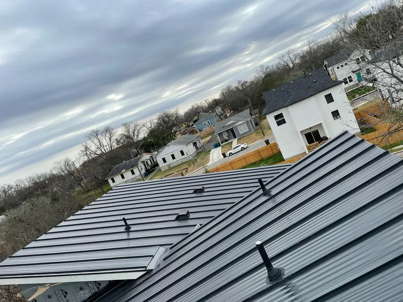 Standing seam metal roof panels with vents for Skylight Repair in Beaver Falls